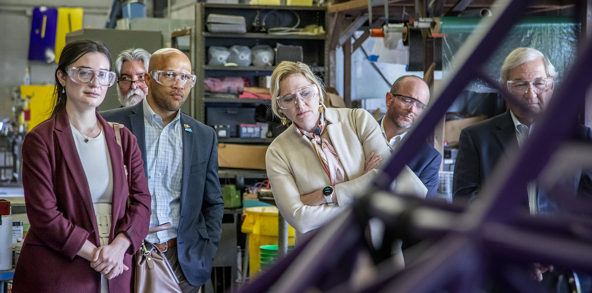 Visitors to LSU Engineering look at a piece of equipment