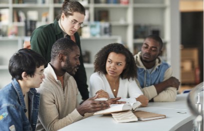 Five people reading a book