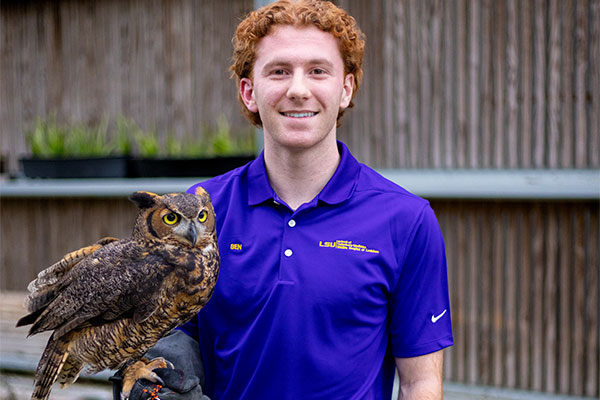 Ben Kuntz with great horned owl